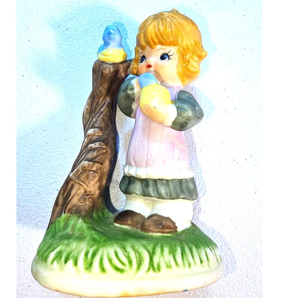 Girl Feeding a Bluebird Figurine
